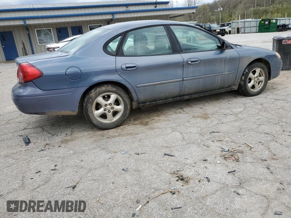 2000 Ford Taurus SE z VIN 1FAFP53U5YA259273, wystawiony jako Copart lot #52787305 z przebiegiem 234 848 mil mil oraz Szkoda całkowita • Salvage title. Historia ofert i sprzedaży dostępna na DreamBid. Obrazek 3.
