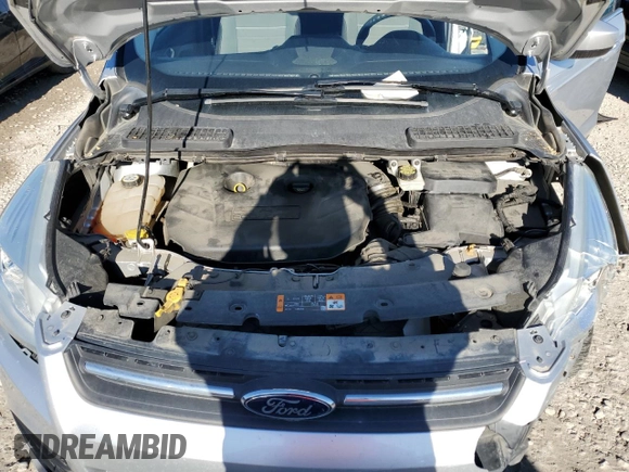 2013 Ford Escape SE z VIN 1FMCU9G96DUD12621, wystawiony jako Copart lot #56176175 z przebiegiem 85 597 mil mil oraz Szkoda całkowita • Salvage title. Historia ofert i sprzedaży dostępna na DreamBid. Obrazek 12.