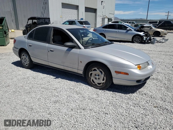 2001 Saturn SL with VIN 1G8ZK52731Z237050, listed as a Copart auction lot 60977394 with Not provided miles and Salvage title. Bid and sale history available at DreamBid. Image 4.