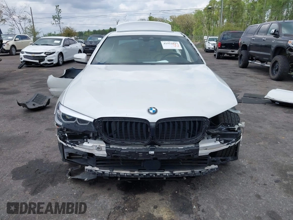 2018 BMW 5 Series 530i with VIN WBAJA5C55JWA38747, listed as a IAAI auction lot 41922937 with 100,951 mi miles and . Bid and sale history available at DreamBid. Image 12.