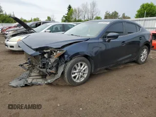 2014 Mazda 3 i Touring with VIN JM1BM1V76E1175377, listed as a Copart auction lot 59704035 with 146,017 mi miles and Salvage title. Bid and sale history available at DreamBid. Image 1.