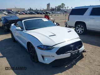 2020 Ford Mustang EcoBoost with VIN 1FATP8UH0L5105965, listed as a IAAI auction lot 42475841 with 68,999 mi miles and . Bid and sale history available at DreamBid. Image 1.