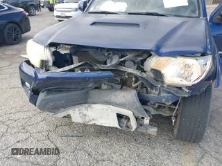 2015 Toyota Tacoma with VIN 3TMMU4FN0FM077148, listed as a IAAI auction lot 41274934 with 112,617 mi miles and . Bid and sale history available at DreamBid. Image 6.