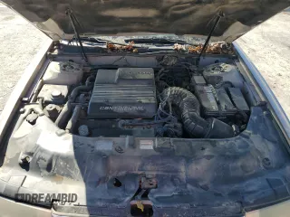 1995 Lincoln Continental with VIN 1LNLM97V8SY681113, listed as a Copart auction lot 73695134 with 176,175 mi miles and Salvage Title. Bid and sale history available at carsss.com. Image 12.