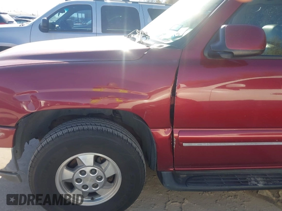 2002 Chevrolet Suburban LT with VIN 1GNEC16Z02J229078, listed as a IAAI auction lot 41737482 with 306,502 mi miles and . Bid and sale history available at DreamBid. Image 6.