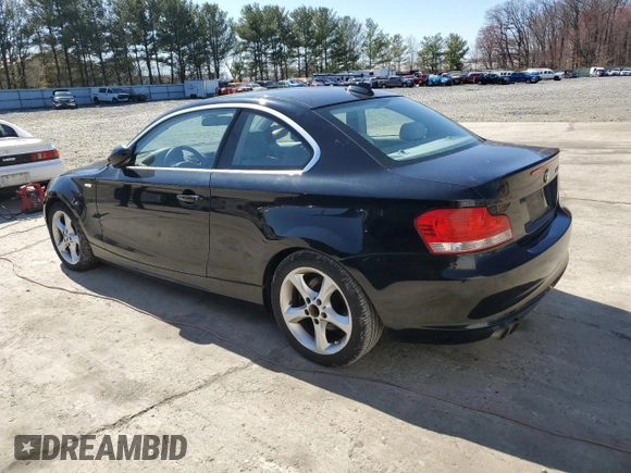 2009 BMW 1 Series 128i with VIN WBAUP93519VF48985, listed as a Copart auction lot 50715925 with 105,590 mi miles and Salvage title. Bid and sale history available at DreamBid. Image 2.