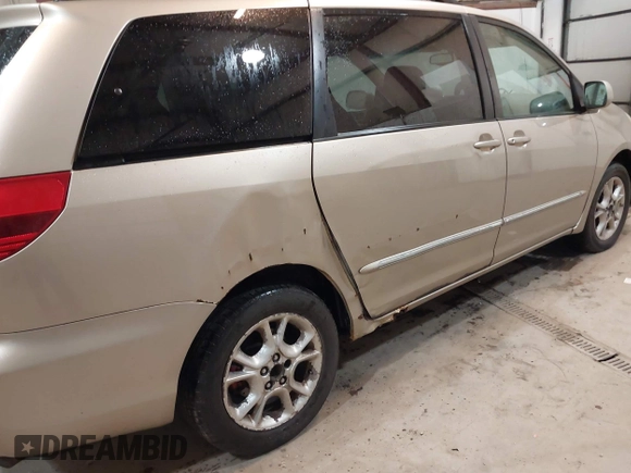 2004 Toyota Sienna XLE with VIN 5TDBA22C14S009558, listed as a IAAI auction lot 41843863 with 232,922 mi miles and . Bid and sale history available at DreamBid. Image 6.