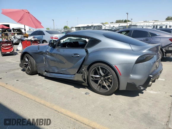 2021 Toyota GR Supra 3.0 with VIN WZ1DB0C01MW042477, listed as a Copart auction lot 70084924 with 59,925 mi miles and Salvage Title. Bid and sale history available at carsss.com. Image 2.