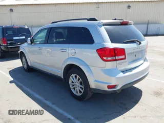 2014 Dodge Journey SXT z VIN 3C4PDDBG8ET212188, wystawiony jako IAAI lot #42101266 z przebiegiem 101 553 mil mil oraz . Historia ofert i sprzedaży dostępna na DreamBid. Obrazek 3.
