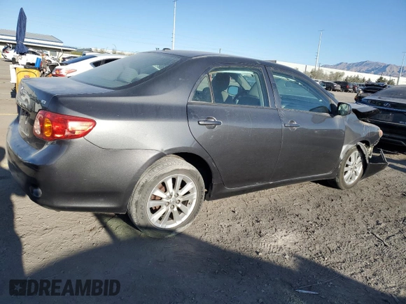 2010 Toyota Corolla with VIN 2T1BU4EE1AC363990, listed as a Copart auction lot 52001595 with 244,000 mi miles and Salvage title. Bid and sale history available at DreamBid. Image 3.
