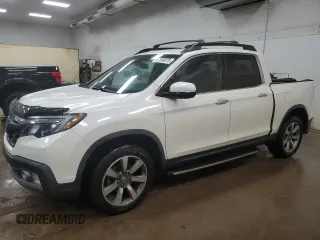 2018 Honda Ridgeline RTL-E with VIN 5FPYK3F74JB001049, listed as a Copart auction lot 57590075 with 111,848 mi miles and Clean title. Bid and sale history available at DreamBid. Image 1.