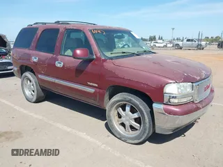 2001 GMC Yukon SLT with VIN 1GKEK13V81J100005, listed as a IAAI auction lot 42090494 with 276,042 mi miles. Bid and sale history available at carsss.com. Image 1.