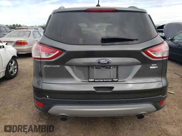 2016 Ford Escape SE with VIN 1FMCU9GX3GUB32712, listed as a Copart auction lot 56870755 with 148,011 mi miles and Clean Title. Bid and sale history available at DreamBid. Image 6.