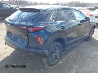 2022 Mazda CX-30 S with VIN 3MVDMBALXNM402265, listed as a IAAI auction lot 41458605 with 76,291 mi miles and . Bid and sale history available at carsss.com. Image 4.