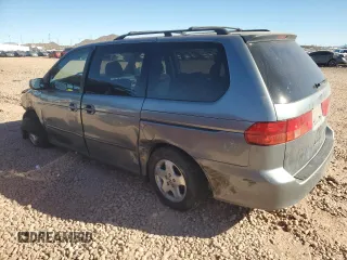 1999 Honda Odyssey EX with VIN 2HKRL1860XH541737, listed as a Copart auction lot 88897965 with 112,164 mi miles and Salvage title. Bid and sale history available at DreamBid. Image 2.