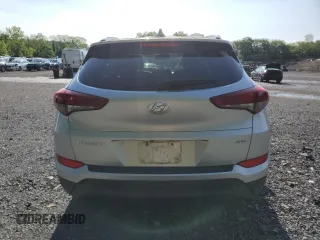 2018 Hyundai Tucson SEL with VIN KM8J3CA49JU666942, listed as a Copart auction lot 58911095 with 73,839 mi miles and Salvage title. Bid and sale history available at DreamBid. Image 6.