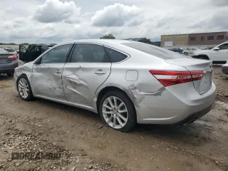 2013 Toyota Avalon XLE with VIN 4T1BK1EB6DU061236, listed as a Copart auction lot 57767745 with 98,958 mi miles and Salvage title. Bid and sale history available at DreamBid. Image 2.
