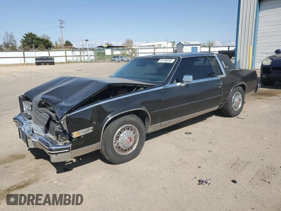 1985 Cadillac Eldorado z VIN 1G6EL5780FE622179, wystawiony jako Copart lot #54109205 z przebiegiem 73 403 mil mil oraz Szkoda całkowita • Salvage title. Historia ofert i sprzedaży dostępna na DreamBid. Obrazek 1.
