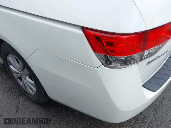 2015 Honda Odyssey EX-L with VIN 5FNRL5H6XFB003972, listed as a IAAI auction lot 41998663 with 171,554 mi miles and . Bid and sale history available at DreamBid. Image 6.