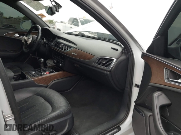 2015 Audi A6 2.0T Premium Plus with VIN WAUGFAFC7FN010019, listed as a IAAI auction lot 42033638 with 1 mi miles. Bid and sale history available at carsss.com. Image 5.