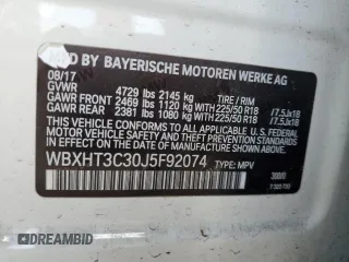 2018 BMW X1 xDrive28i with VIN WBXHT3C30J5F92074, listed as a Copart auction lot 51069535 with 116,381 mi miles and Salvage Title. Bid and sale history available at carsss.com. Image 15.