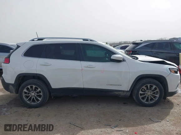 2019 Jeep Cherokee Latitude Plus with VIN 1C4PJLLB0KD307741, listed as a IAAI auction lot 41750370 with 76,036 mi miles. Bid and sale history available at carsss.com. Image 13.