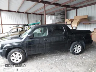 2007 Honda Ridgeline RTL with VIN 2HJYK16547H549241, listed as a IAAI auction lot 42282477 with 214,685 mi miles and . Bid and sale history available at DreamBid. Image 14.