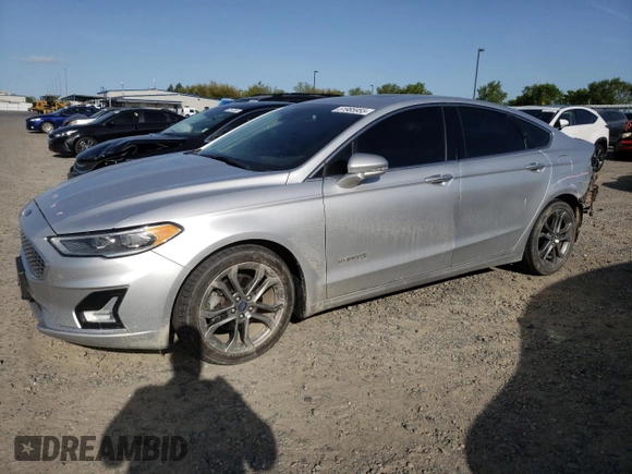 2019 Ford Fusion Titanium z VIN 3FA6P0RU5KR217242, wystawiony jako Copart lot #51985955 z przebiegiem 95 220 mil mil oraz Szkoda całkowita • Salvage title. Historia ofert i sprzedaży dostępna na DreamBid. Obrazek 1.