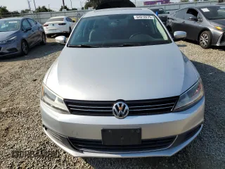 2014 Volkswagen Jetta SE с VIN 3VWD17AJ9EM437088, выставлен на аукционе Copart как лот 64810275 с пробегом 92 165 миль миль и Списание • Salvage title. История ставок и продаж доступна на DreamBid. Изображение 5.