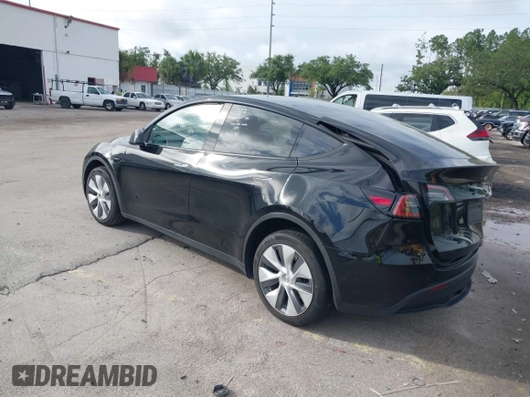 2023 Tesla Model Y Long Range with VIN 7SAYGDEE2PA044328, listed as a IAAI auction lot 42427625 with 41,324 mi miles and . Bid and sale history available at DreamBid. Image 3.