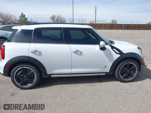 2016 MINI Countryman S with VIN WMWZC5C57GWU22015, listed as a IAAI auction lot 41806547 with 65,124 mi miles and . Bid and sale history available at DreamBid. Image 14.
