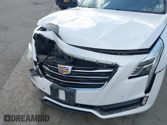 2016 Cadillac CT6 Luxury AWD with VIN 1G6KD5RSXGU154557, listed as a IAAI auction lot 41550199 with 102,536 mi miles and . Bid and sale history available at DreamBid. Image 6.