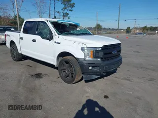 2018 Ford F-150 XL with VIN 1FTEW1EB3JKF67829, listed as a IAAI auction lot 41417816 with 219,899 mi miles. Bid and sale history available at carsss.com. Image 1.