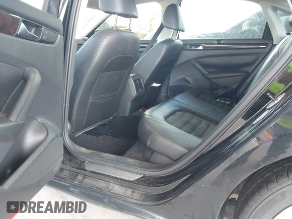 2014 Volkswagen Passat SEL Premium with VIN 1VWCN7A37EC071313, listed as a IAAI auction lot 42796404 with 78,444 mi miles and . Bid and sale history available at DreamBid. Image 8.