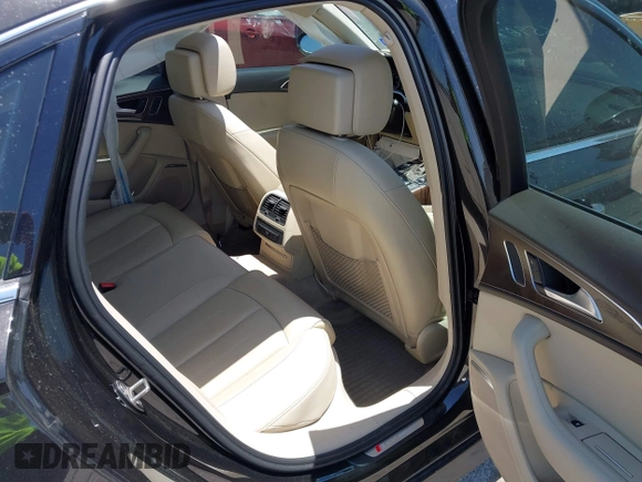 2016 Audi A6 Premium Plus with VIN WAUGFAFC0GN166596, listed as a IAAI auction lot 42526292 with 106,584 mi miles and . Bid and sale history available at DreamBid. Image 8.