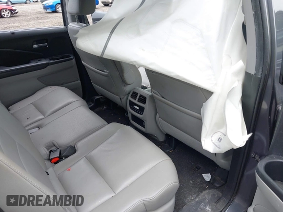 2019 Honda Pilot EX-L with VIN 5FNYF6H5XKB096065, listed as a IAAI auction lot 42631239 with 171,768 mi miles and . Bid and sale history available at DreamBid. Image 8.