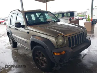 2003 Jeep Liberty Sport with VIN 1J4GK48K13W633818, listed as a IAAI auction lot 41962552 with 217,884 mi miles and . Bid and sale history available at DreamBid. Image 1.