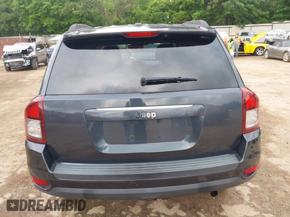2014 Jeep Compass Sport with VIN 1C4NJCBA1ED725875, listed as a IAAI auction lot 42118863 with 133,136 mi miles. Bid and sale history available at carsss.com. Image 17.