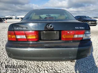 1999 Lexus ES 300 Luxury Sport Sdn with VIN JT8BF28G3X0225168, listed as a Copart auction lot 64237184 with 156,780 mi miles and Salvage Title. Bid and sale history available at carsss.com. Image 6.