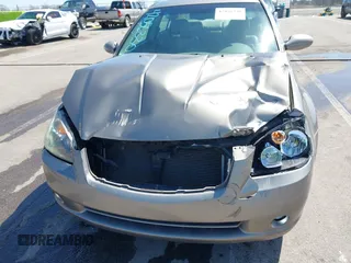 2005 Nissan Altima SE z VIN 1N4BL11D65C148642, wystawiony jako IAAI lot #42056330 z przebiegiem 81 328 mil mil oraz . Historia ofert i sprzedaży dostępna na DreamBid. Obrazek 6.