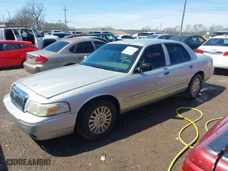 2008 Mercury Grand Marquis LS with VIN 2MEFM75V48X625878, listed as a IAAI auction lot 41874444 with 220,592 mi miles. Bid and sale history available at carsss.com. Image 2.