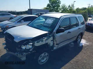 2006 Honda CR-V LX z VIN SHSRD78596U445523, wystawiony jako IAAI lot #42212230 z przebiegiem 141 228 mil mil oraz . Historia ofert i sprzedaży dostępna na DreamBid. Obrazek 2.