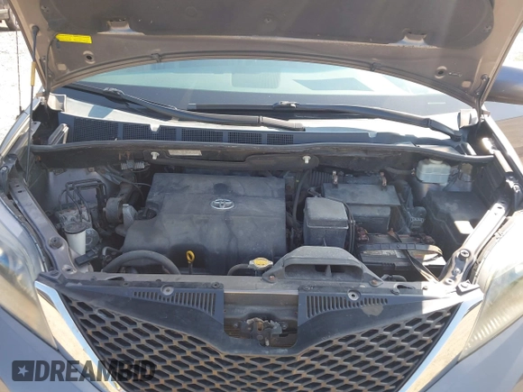 2012 Toyota Sienna SE with VIN 5TDXK3DCXCS267405, listed as a IAAI auction lot 42401101 with 134,553 mi miles and . Bid and sale history available at DreamBid. Image 10.