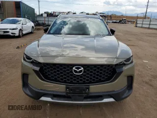 2023 Mazda CX-50 Premium z VIN 7MMVABDYXPN103342, wystawiony jako Copart lot #56426525 z przebiegiem 37 143 mil mil oraz Szkody całkowita. Historia ofert i sprzedaży dostępna na DreamBid. Obrazek 5.