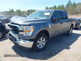 2022 Ford F-150 XL with VIN 1FTFW1E87NFB86556, listed as a IAAI auction lot 42157650 with 54,726 mi miles and . Bid and sale history available at DreamBid. Image 2.