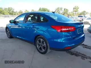 2016 Ford Focus SE with VIN 1FADP3FE3GL226145, listed as a IAAI auction lot 42166519 with 85,769 mi miles. Bid and sale history available at carsss.com. Image 3.