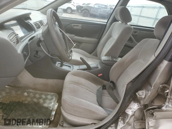 2000 Toyota Camry CE with VIN JT2BG22K6Y0471945, listed as a Copart auction lot 48932715 with Not Provided miles and Salvage Title. Bid and sale history available at DreamBid. Image 7.