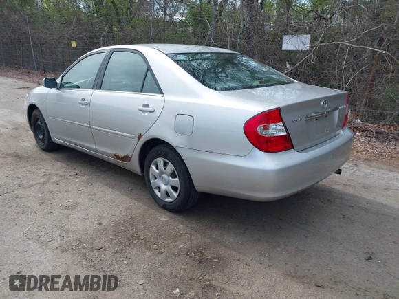 2002 Toyota Camry LE z VIN 4T1BE32K42U029129, wystawiony jako IAAI lot #42190162 z przebiegiem 191 423 mil mil oraz . Historia ofert i sprzedaży dostępna na DreamBid. Obrazek 3.