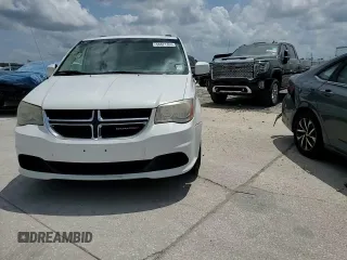 2014 Dodge Grand Caravan SXT z VIN 2C4RDGCG8ER428893, wystawiony jako Copart lot #56671355 z przebiegiem 261 815 mil mil oraz Szkoda całkowita • Salvage title. Historia ofert i sprzedaży dostępna na DreamBid. Obrazek 15.