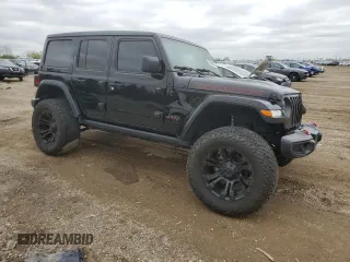 2021 Jeep Wrangler Unlimited Rubicon z VIN 1C4HJXFN1MW793064, wystawiony jako Copart lot #55643305 z przebiegiem 51 944 mil mil oraz Szkoda całkowita • Salvage title. Historia ofert i sprzedaży dostępna na DreamBid. Obrazek 4.